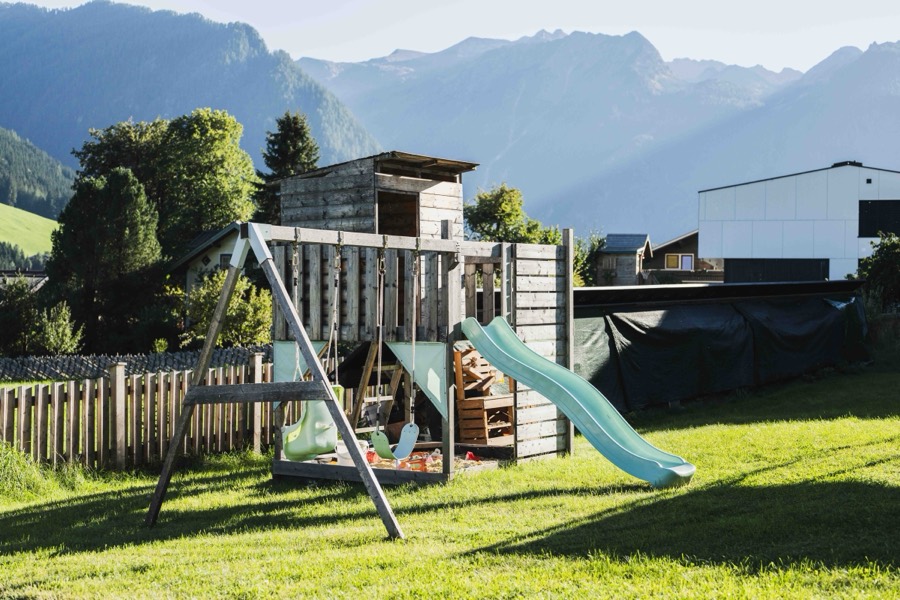 Children's playground with slide in the garden