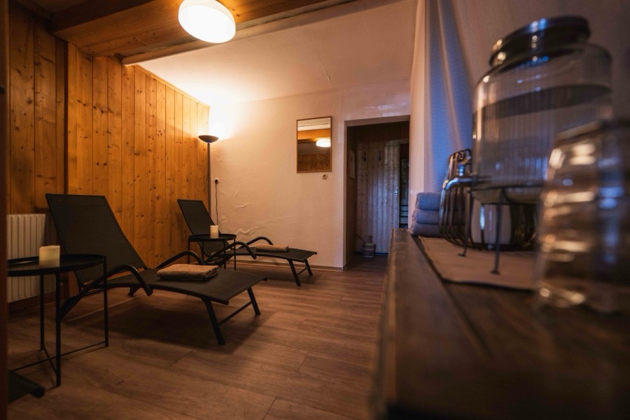 Relaxation room with loungers in the sauna area